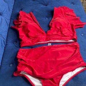Two piece bathing suit. The color is burgundy